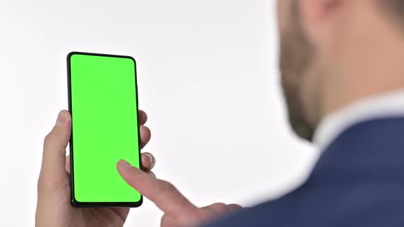 Businessman Using Cellphone with Chroma Screen, White Background