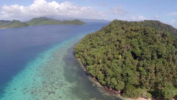 Aerial drone view of a scenic tropical island in Fiji