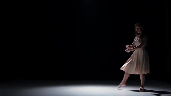 Talanted Woman Dancer Dancing Contemporary Dance Moves and Somersault, on Black, Shadow