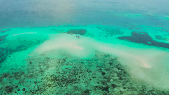 Sandy Beach on a Coral Reef. Balabac, Palawan, Philippines.