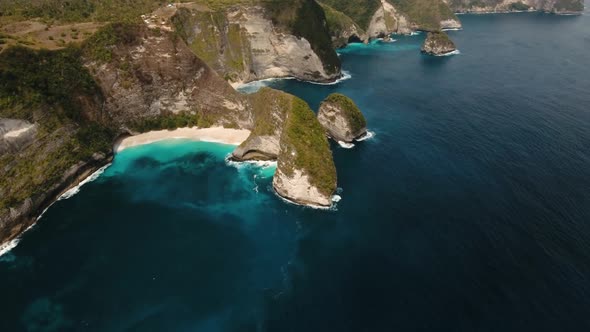 Rocky Cliff with Beach in the Sea. Karang Dawa