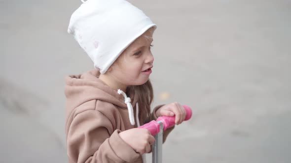 Little Girl on Scooter Close Up Outdoor Caucasian Female Kid Active Leisure