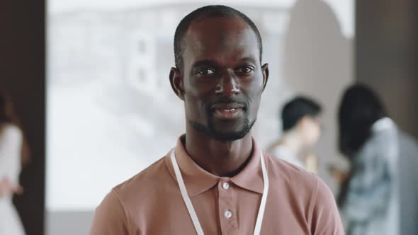 Portrait of Cheerful Black Man on Business Conference