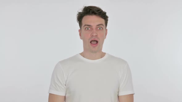 Shocked Young Man Wondering on White Background