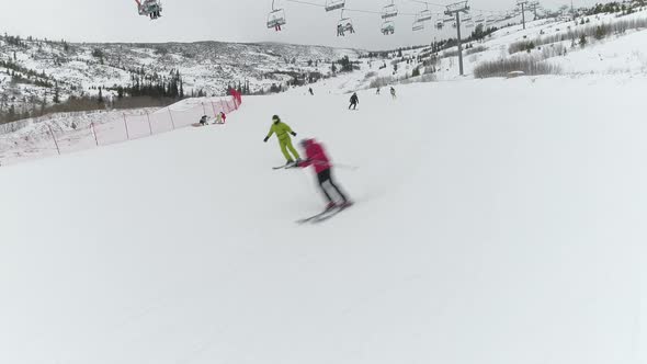 Skiers on a Skiing Run