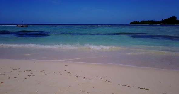 Luxury fly over island view of a summer white paradise sand beach and aqua blue water background in 