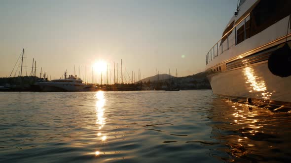 Time Lapse Sunset in the Port of the Resort Town of Bodrum, Turkey. Luxury Yacht Moored in the Bay