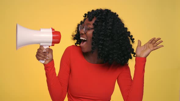 Positive Black Woman Screaming in Megaphone