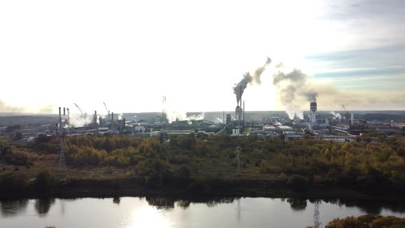 Aerial view of industrial area with chemical plant. Smoking chimney from factory. Chemistry factory