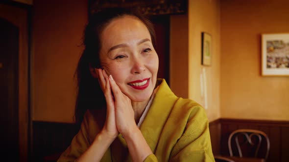 Elegant Japanese woman enjoying a coffee