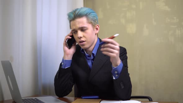 Young Businessmen Smoking Iqos Talking By Telephone at Work Desk Office Work