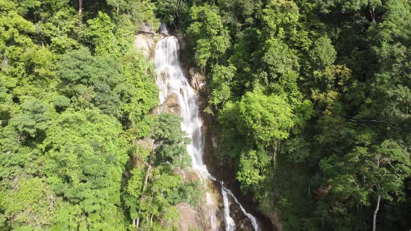 Aerial view beautiful water cascading at waterfall