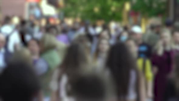 Silhouettes of People Walking in a Crowd Slow Motion