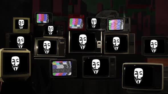 Guy Fawkes Masks on Retro TV Stack.
