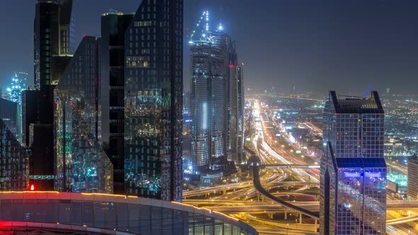 Dubai Downtown Skyline Night Timelapse and Sheikh Zayed Road Traffic UAE