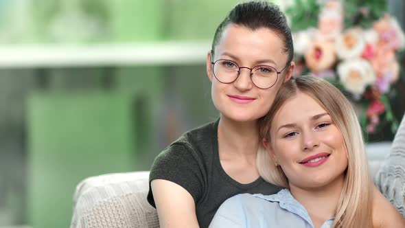 Closeup Face of Two Happy Lesbian Woman Feeling Love Smiling Hugging Relaxing Together