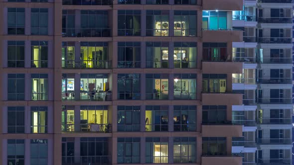 Glowing Windows of Skyscrapers at Evening Timelapse