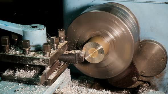 Lathe in Action. Processing Brass Billet Slow Motion