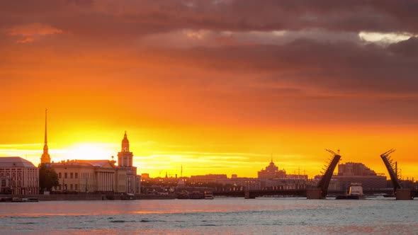 Saint Petersburg Russia Beautiful Sunrise with Opening Palace Bridge and Boats on Neva River 