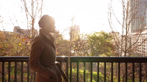 Mixed ethnicity business woman walking