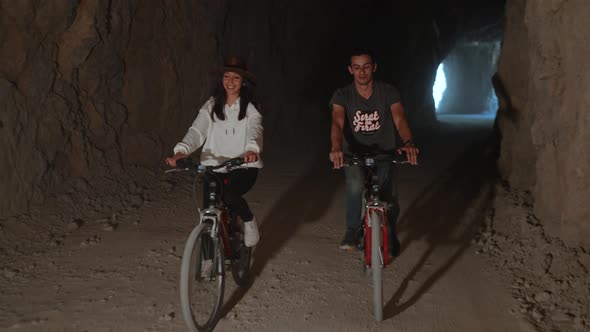 Couple Enjoying Bike Ride in Canyon