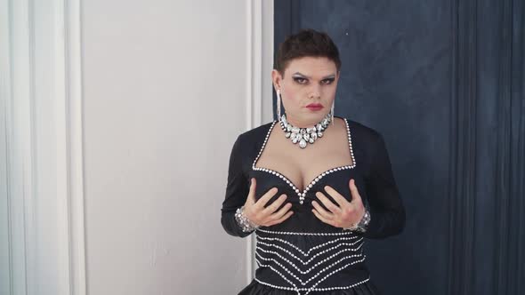 Drag Queen with False Breasts Without a Wig