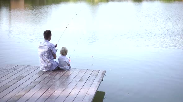 Family fishing outdoors