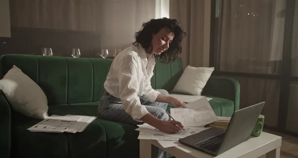 Woman Working on Architectural Project at Home