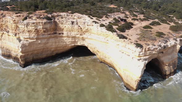 Marinha beach eroded cliffs in Benagil village in Algarve, Portugal
