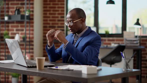 Frustrated Employee Making Work Mistake on Laptop