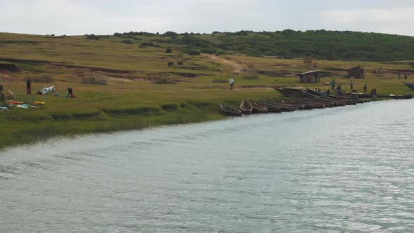 Late afternoon view of a fishing village in Lake Albert Uganda