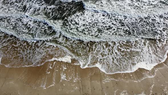 Aerial Drone View Flight Over Beautiful Sea Waves on Sand Beach with White Foam