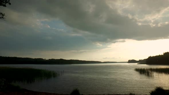 Rain over the lake in the summer