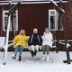 Three Adult Women Ride on a Swing with Snow Around Them - VideoHive Item for Sale