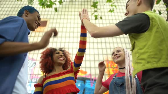 Young Multiracial People Joining Hands, Friendship Greeting Gesture, Having Fun