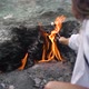 Slim Woman Roasts Marshmallows Over Chimaera Mountain Fire - VideoHive Item for Sale