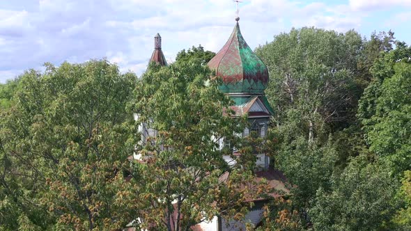 Drone revealing an abandoned church in the radioactive forest of Chernobyl Ukraine. forest and dome