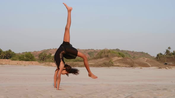 Teen Girl Doing Cartwheel Two Times and Sitting in Twine