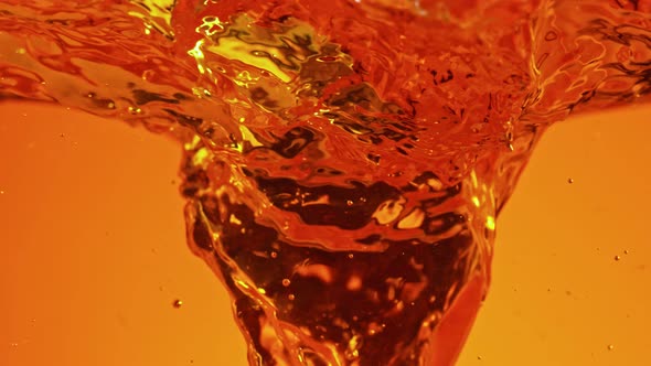 Super Slow Motion Shot of Golden Liquid Vortex at 1000 Fps