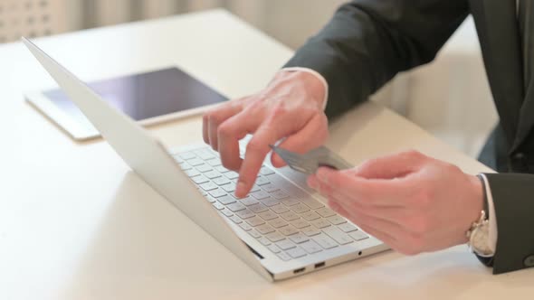 Top View of Middle Aged Businessman Having Online Payment Failure on Laptop