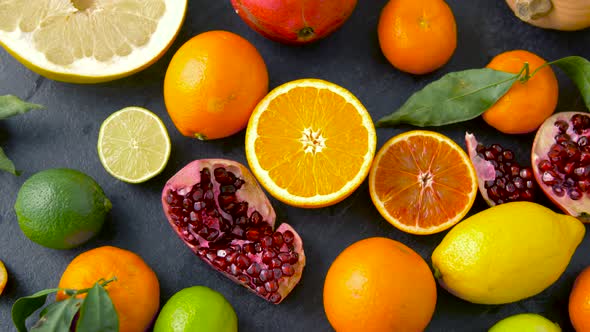 Close Up of Citrus Fruits on Stone Table 42