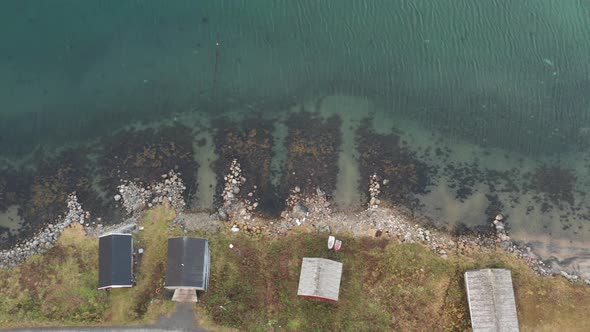 Drone Over Buildings And Road By Fjord