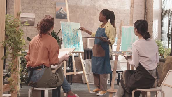 Adults Studying Art in Studio