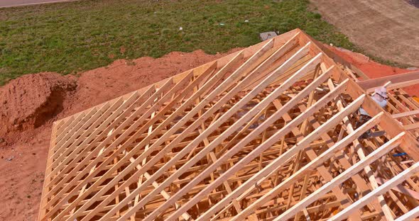 Timber Frame House of Wooden Beam Framework on Stick Built Home