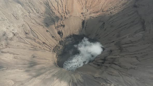 Aerial drone view of volcanic gas and steam from an active volcano
