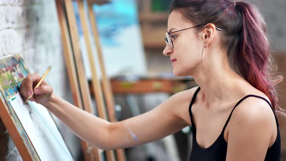 Smiling Hipster Woman Painter Making Graphic Illustration on White Paper Sheet Medium Closeup