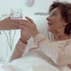 Home Caregiver Helping Elderly Woman Drink Water - VideoHive Item for Sale