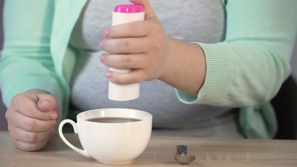 Overweight Girl Putting Sweetener Into the Tea, Consequences of Diabetes