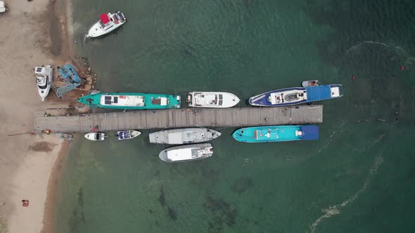 Boats and Yachts on the Pier at an Uninhabited Sandy Island on Lake Baikal Siberia