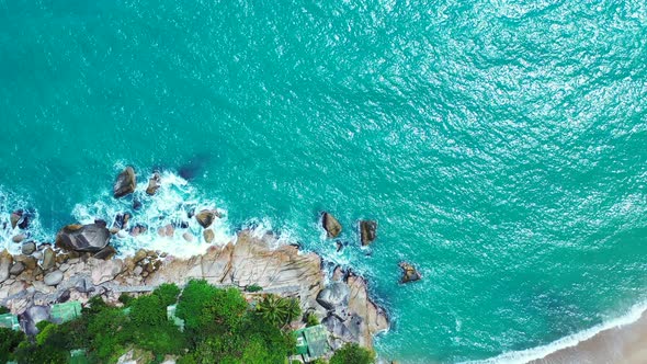 Rocks by Haad Rin Beach Koh Phangan Thailand. Relaxing beach , blue ocean water and white sand. Aeri